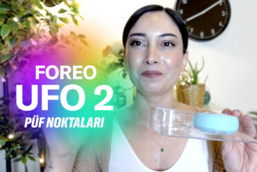 A person holding a red light therapy device, demonstrating its use for targeted light therapy.