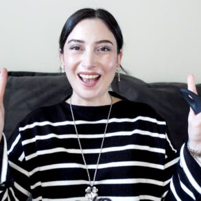 Woman using Foreo Iris eye massage device for skincare routine