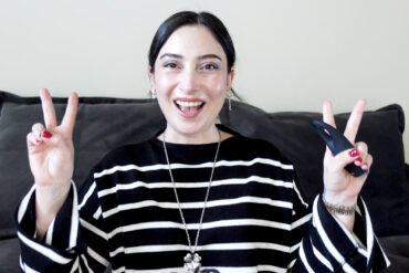 Woman using Foreo Iris eye massage device for skincare routine